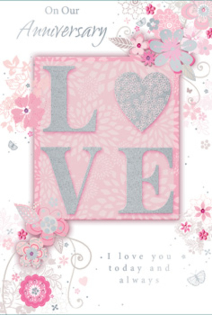 In this image, an anniversary card is opened slightly, revealing a design that feels like stepping into a sunlit Brockley living room where love is woven into everyday life. The focal point is the word LOVE, printed in large, capital letters across the front in frosted glitter that seems to shimmer softly rather than shine sharply. The glittered letters are slightly embossed, catching the light as though sprinkled with fine sugar, offering a tactile delight that invites fingertips to trace each curve. Around this central word, a drift of hand-drawn blooms frames the composition, their lines wispy and light, like a florist's quick sketch before gathering stems at Brockley Florist. The flowers range through a harmony of pinks, soft lilac shades, and creamy ivory tones, with petals overlapping gently and tiny leaves peeking between them. Fine filigree flourishes weave in and out of the blossoms, and if you look closely, you can see delicate butterfly shapes nestled among the petals, almost hidden, suggesting quiet joy and the flutter of affectionate hearts. The background remains softly pink, lending warmth without distraction. At the bottom, the phrase I love you today and always sits in understated, elegant type, its simplicity grounding the more decorative elements. Shadows cast by the raised letters and embossed flowers add depth, emphasizing the sense of careful craftsmanship. The overall mood is calm, thankful, and enduring, like a couple sharing coffee together before a walk through nearby Hilly Fields, their love celebrated not with fanfare but with steady devotion.